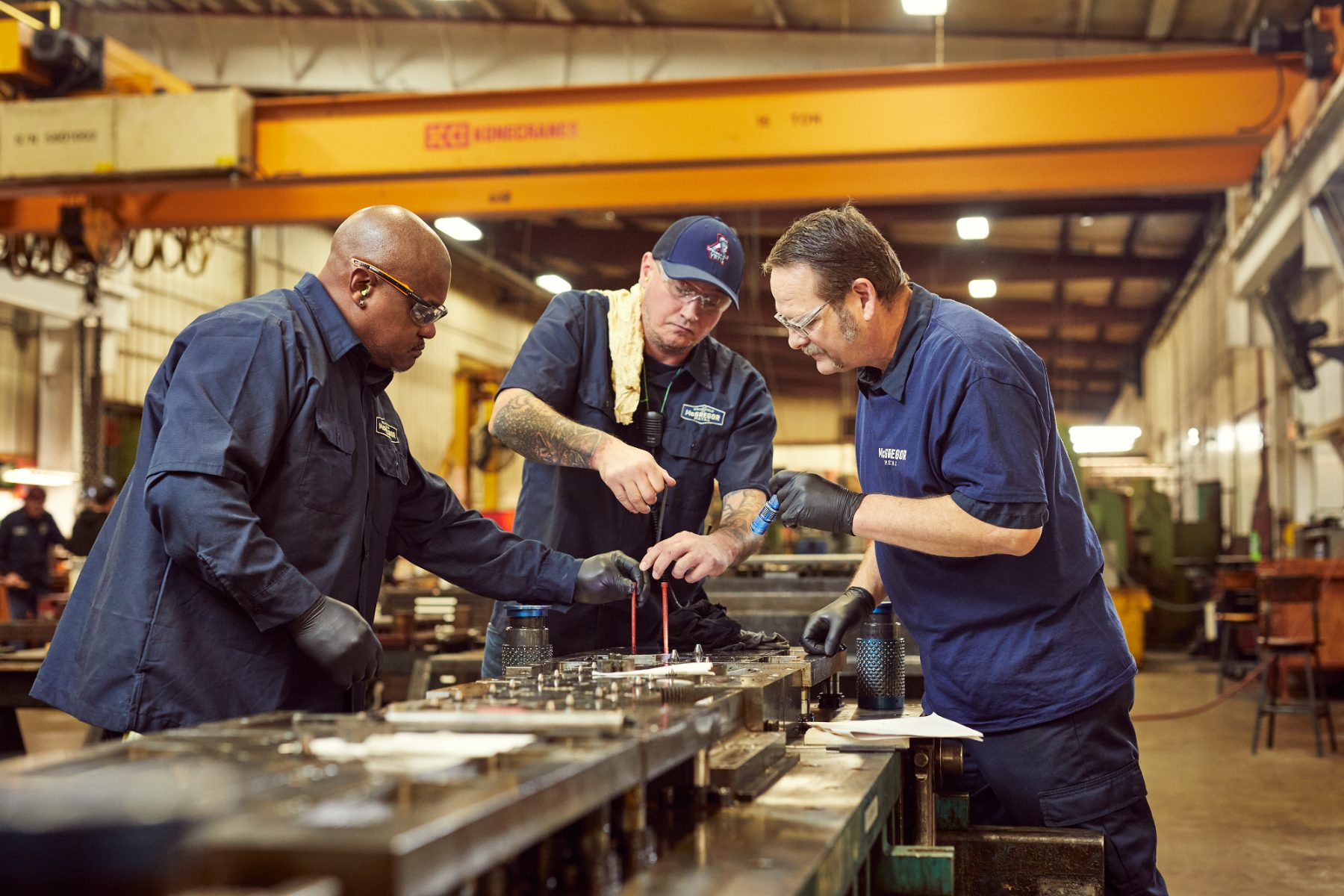 McGregor Metal team collaborating on the shop floor
